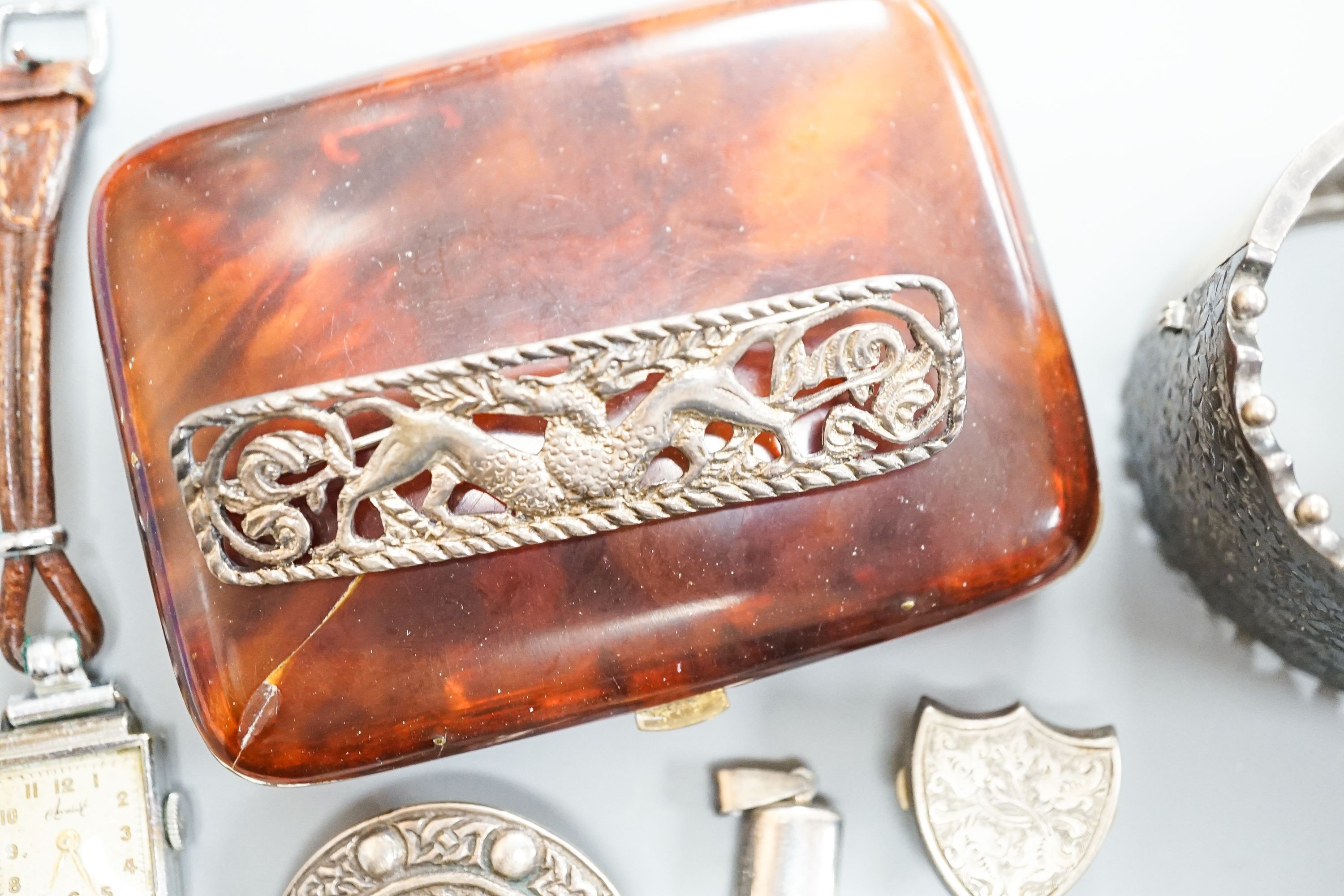 An engraved silver bangle, two silver brooches, including Scottish, two lady's wrist watches and a small group of minor jewellery, etc.